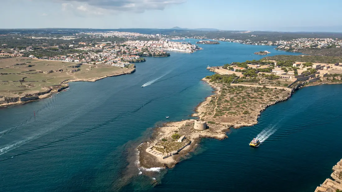 The mouth of the Port of Mahón opening onto the Mediterranean, the natural entrance to Menorca's harbour