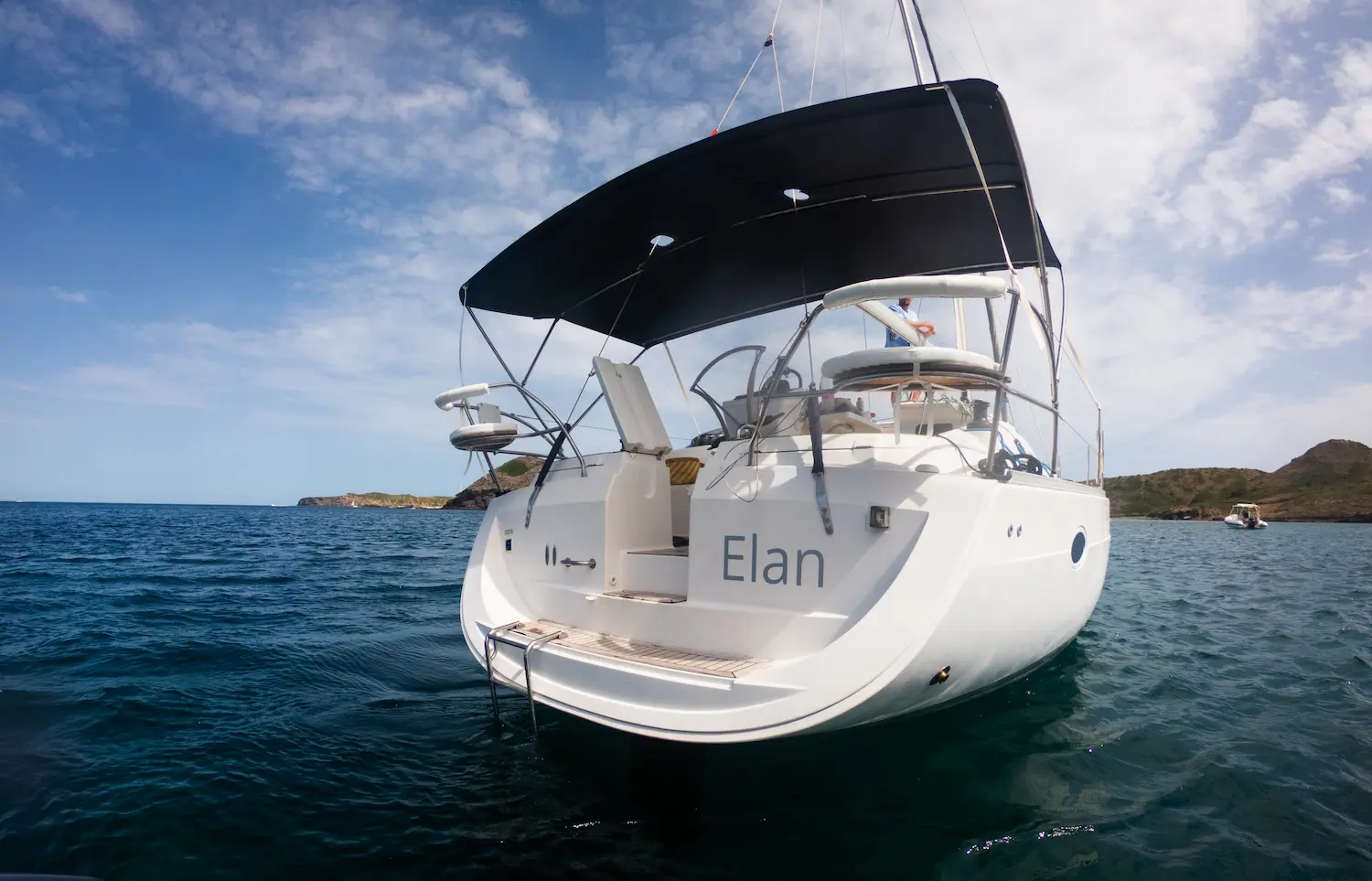 Elan sailboat anchored during a private trip around Menorca